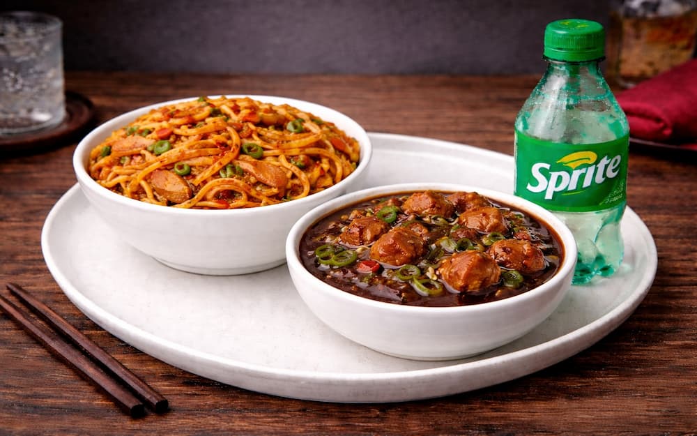 Schezwan Chicken Noodles + Chicken Manchurian Gravy + Soft Drink
